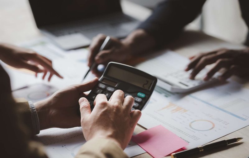 Group business people are having a meeting and planning their business together in the conference room, leaders of startup companies share their opinions and discuss how to run a successful business.